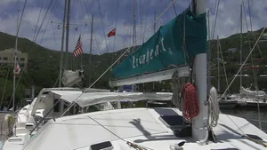 The LionHeart, our catamaran, sailing in Tortola harbor.
